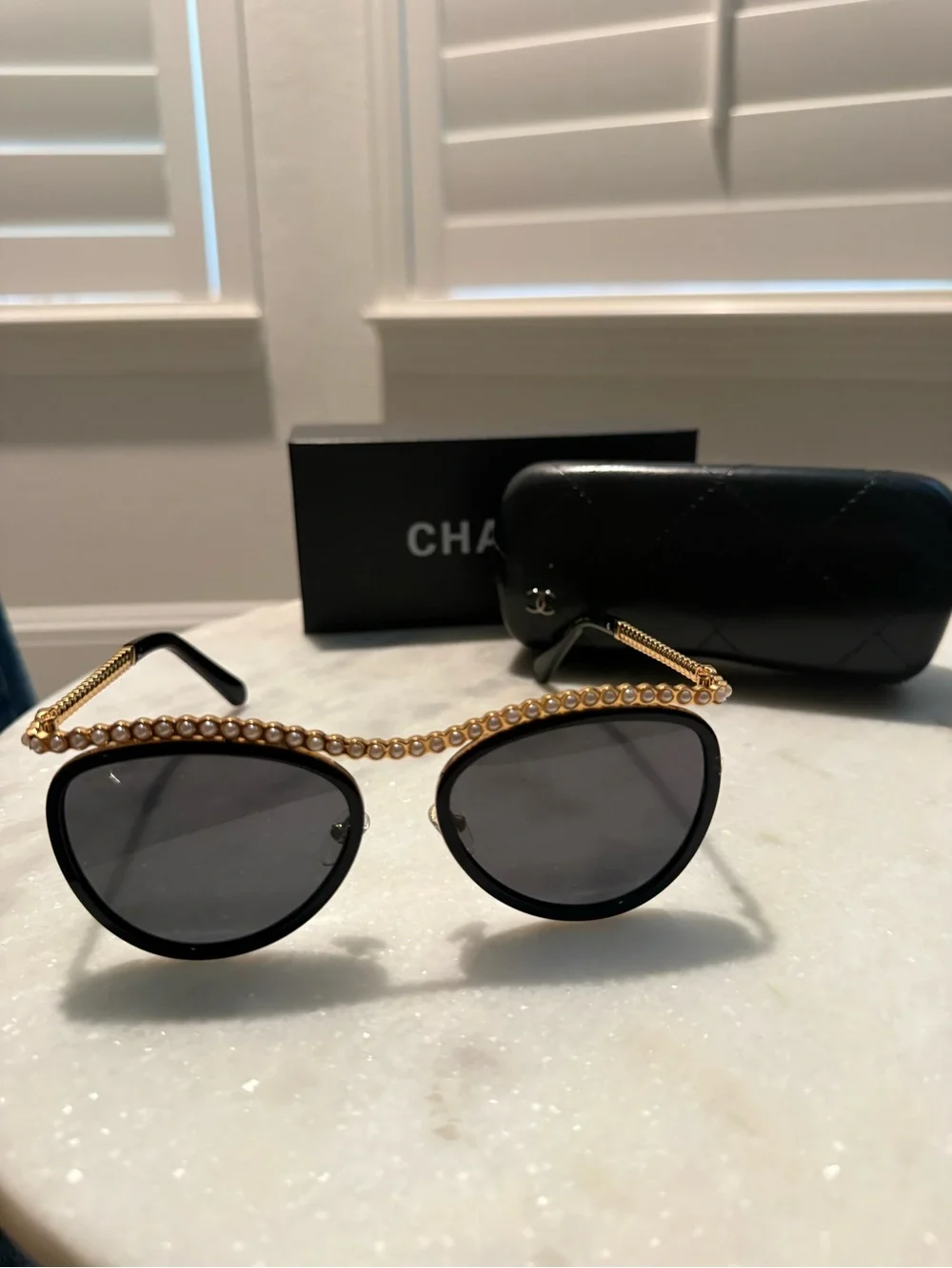 CHANEL Black Sunglasses with Gold Pearl Detail